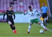 24 May 2024; Evan McLaughlin of Cork City in action against William Armshaw of Treaty United during the SSE Airtricity Men's First Division match between Cork City and Treaty United at Turner's Cross in Cork. Photo by Tyler Miller/Sportsfile