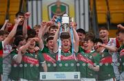 24 May 2024; Mayo captain David Hurley lifts the The Tom Kilcoyne Cup after the Connacht GAA Football Minor Championship final match between Mayo and Roscommon at Dr Hyde Park in Roscommon. Photo by Stephen Marken/Sportsfile