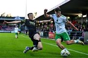 24 May 2024; Josh Fitzpatrick of Cork City in action against Ben O'Riordan of Treaty United during the SSE Airtricity Men's First Division match between Cork City and Treaty United at Turner's Cross in Cork. Photo by Tyler Miller/Sportsfile
