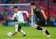 24 May 2024; Evan McLaughlin of Cork City in action against Adam O'Halloran of Treaty United during the SSE Airtricity Men's First Division match between Cork City and Treaty United at Turner's Cross in Cork. Photo by Tyler Miller/Sportsfile