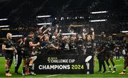 24 May 2024; Hollywoodbets Sharks players, including team-mate Aphelele Fassi, celebrate with the trophy after their side's victory in the EPCR Challenge Cup final match between Gloucester and Hollywoodbets Sharks at the Tottenham Hotspur Stadium in London, England. Photo by Harry Murphy/Sportsfile