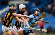 25 May 2024; Rory Flannery of Dublin is tackled by Larry Phelan, left, and Jack Dollard of Kilkenny during the Leinster GAA Hurling Minor Championship final match between Dublin and Kilkenny at Laois Hire O'Moore Park in Portlaoise, Laois. Photo by Tom Beary/Sportsfile