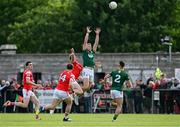 25 May 2024; Ronan Jones of Meath in action against Conor Grimes of Louth during the GAA Football All-Ireland Senior Championship Round 1 match between Louth and Meath at Grattan Park in Inniskeen, Monaghan. Photo by Daire Brennan/Sportsfile