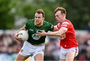 25 May 2024; Ronan Jones of Meath in action against Ciaran Keenan of Louth during the GAA Football All-Ireland Senior Championship Round 1 match between Louth and Meath at Grattan Park in Inniskeen, Monaghan. Photo by Daire Brennan/Sportsfile
