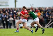 25 May 2024; Sam Mulroy of Louth in action against Donal Keogan of Meath during the GAA Football All-Ireland Senior Championship Round 1 match between Louth and Meath at Grattan Park in Inniskeen, Monaghan. Photo by Daire Brennan/Sportsfile