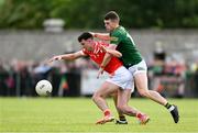 25 May 2024; Craig Lennon of Louth in action against Eoghan Frayne of Meath during the GAA Football All-Ireland Senior Championship Round 1 match between Louth and Meath at Grattan Park in Inniskeen, Monaghan. Photo by Daire Brennan/Sportsfile