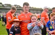 25 May 2024; Peter McGrane of Armagh with supporters after the GAA Football All-Ireland Senior Championship Round 1 match between Armagh and Westmeath at the Box It Athletic Grounds in Armagh. Photo by Ben McShane/Sportsfile