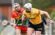 26 May 2024; Paddy Burke of Antrim is tackled by Chris Nolan of Carlow during the Leinster GAA Hurling Senior Championship Round 5 match between Antrim and Carlow at Corrigan Park in Belfast. Photo by Shauna Clinton/Sportsfile