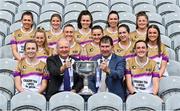 28 May 2024; Pictured at the launch of the 2024 TG4 All-Ireland Ladies Football Championships in Dublin, are Ard Stiúrthóir TG4 Alan Esslemont and Uachtarán Cumann Peil Gael na mBan, Mícheál Naughton with senior players. All roads lead to Croke Park for the 2024 TG4 All-Ireland Junior, Intermediate and Senior Finals on Sunday August 4, as the Ladies Gaelic Football Association also gets set to celebrate its 50th anniversary on July 18, 2024. #ProperFan. Photo by David Fitzgerald/Sportsfile