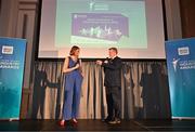 28 May 2024; MC Gráinne McElwain and Sport for Business Founder and chair of the judging Panel Rob Hartnett speak on the stage during the 2024 Irish Sport Industry Sport Awards at College Green Hotel in Dublin. Photo by Sam Barnes/Sportsfile