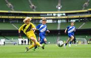 29 May 2024; Lewis Quinn of St Eunan’s NS, Raphoe, Donegal, scores a goal in the B Cup, for mixed medium sized schools, during the FAI Primary 5s Finals day at Aviva Stadium in Dublin. Photo by Stephen McCarthy/Sportsfile