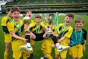29 May 2024; Gaelscoil Cois Feabhail, Craigtown, Donegal, players celebrates after winning the section A cup, for mixed small sized schools, during the FAI Primary 5s Finals day at Aviva Stadium in Dublin. Photo by Stephen McCarthy/Sportsfile