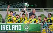 29 May 2024; Gaelscoil Cois Feabhail, Craigtown, Donegal, players celebrates after winning the section A cup, for mixed small sized schools, during the FAI Primary 5s Finals day at Aviva Stadium in Dublin. Photo by Stephen McCarthy/Sportsfile
