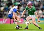 26 May 2024; Shane O'Brien of Limerick in action against Iarlaith Daly of Waterford during the Munster GAA Hurling Senior Championship Round 5 match between Limerick and Waterford at TUS Gaelic Grounds in Limerick. Photo by Sam Barnes/Sportsfile