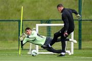31 May 2024; Goalkeeper Max O'Leary, left, and Goalkeeping coach Rene Gilmartin during a Republic of Ireland training session at the FAI National Training Centre in Abbotstown, Dublin. Photo by Stephen McCarthy/Sportsfile