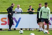31 May 2024; Interim head coach John O'Shea, left, with, from second from left, Republic of Ireland U21 manager Jim Crawford, U21 goalkeeping coach Richie Fitzgibbon, StatSport analyst Andrew Morrissey and Enda Stevens during a Republic of Ireland training session at the FAI National Training Centre in Abbotstown, Dublin. Photo by Stephen McCarthy/Sportsfile
