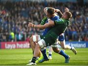 31 May 2024; Jack Conan of Leinster on his way to scoring his side's first try despite the efforts of Conor Oliver, left and Sean Jansen of Connacht during the United Rugby Championship match between Leinster and Connacht at the RDS Arena in Dublin. Photo by Sam Barnes/Sportsfile