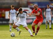 31 May 2024; Kailin Barlow of Sligo Rovers is tackled by Mark Coyle of Shelbourne during the SSE Airtricity Men's Premier Division match between Shelbourne and Sligo Rovers at Tolka Park in Dublin. Photo by Tom Beary/Sportsfile