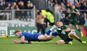 31 May 2024; Ciarán Frawley of Leinster scores his side's third try despite the tackle of Conor Oliver of Connacht during the United Rugby Championship match between Leinster and Connacht at the RDS Arena in Dublin. Photo by Sam Barnes/Sportsfile