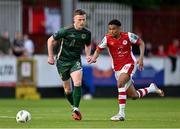 31 May 2024; Romal Palmer of St Patrick's Athletic in action against Killian Brouder of Galway United during the SSE Airtricity Men's Premier Division match between St Patrick's Athletic and Galway United at Richmond Park in Dublin. Photo by Stephen Marken/Sportsfile