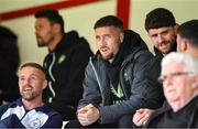 31 May 2024; Injured Shelbourne player Keith Ward, left, with Republic of Ireland internationals Matt Doherty, centre, and Robbie Brady during the SSE Airtricity Men's Premier Division match between Shelbourne and Sligo Rovers at Tolka Park in Dublin. Photo by Tom Beary/Sportsfile