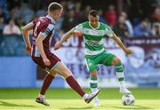 31 May 2024; Graham Burke of Shamrock Rovers in action against Jack Keaney of Drogheda United during the SSE Airtricity Men's Premier Division match between Drogheda United and Shamrock Rovers at Weavers Park in Drogheda, Louth. Photo by Shauna Clinton/Sportsfile