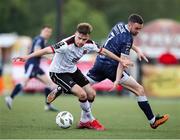 31 May 2024; Archie Davies of Dundalk in action against Michael Duffy of Derry City during the SSE Airtricity Men's Premier Division match between Dundalk and Derry City at Oriel Park in Dundalk, Louth. Photo by Michael P Ryan/Sportsfile