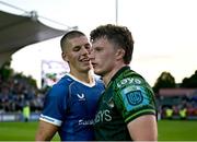31 May 2024; Brothers Sam Prendergast of Leinster and Cian Prendergast of Connacht embrace after the United Rugby Championship match between Leinster and Connacht at the RDS Arena in Dublin. Photo by Harry Murphy/Sportsfile