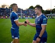 31 May 2024; Sam Prendergast and Scott Penny of Leinster after their side's victory in the United Rugby Championship match between Leinster and Connacht at the RDS Arena in Dublin. Photo by Harry Murphy/Sportsfile