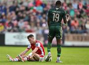 31 May 2024; Mason Melia of St Patrick's Athletic after being fouled by Francely Lomboto of Galway United during the SSE Airtricity Men's Premier Division match between St Patrick's Athletic and Galway United at Richmond Park in Dublin. Photo by Stephen Marken/Sportsfile