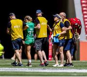 1 June 2024; Aoibheann Reilly of Ireland leaves the pitch injured during the HSBC Women's SVNS 2024 Grand Finals Pool B match between Ireland and France at Civitas Metropolitano Stadium in Madrid, Spain. Photo by Juan Gasparini/Sportsfile