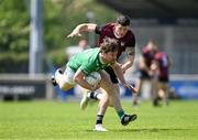 1 June 2024; Cahir Healy of London in action against Iain Corbett of Limerick during the Tailteann Cup Group 4 Round 3 match between Limerick and London at Parnell Park in Dublin. Photo by Daire Brennan/Sportsfile