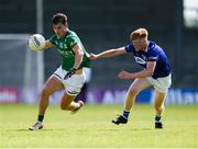 1 June 2024; Jonathan Cassidy of Fermanagh is tackled by Roghan Murphy of Laois during the Tailteann Cup Group 3 Round 3 match between Fermanagh and Laois at Glennon Brothers Pearse Park in Longford. Photo by Tom Beary/Sportsfile