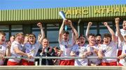 1 June 2024; Cillian Early of Tyrone holds aloft the Electric Ireland Corn Jerome O'Leary Celtic Challenge trophy after the Electric Ireland Corn Jerome O'Leary Celtic Challenge final match between Tyrone and Sligo at Fr Tierney Park in Ballyshannon, Donegal. Photo by Oliver McVeigh/Sportsfile