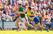 1 June 2024; Eoghan McLaughlin of Mayo is tackled by David Murray of Roscommon during the GAA Football All-Ireland Senior Championship Round 2 match between Roscommon and Mayo at Dr Hyde Park in Roscommon. Photo by Ben McShane/Sportsfile