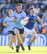 1 June 2024; Brian Fenton of Dublin in action against Gerard Smith of Cavan during the GAA Football All-Ireland Senior Championship Round 2 match between Cavan and Dublin at Kingspan Breffni in Cavan. Photo by Ramsey Cardy/Sportsfile