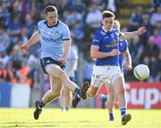 1 June 2024; Brian Fenton of Dublin shoots under pressure from Gerard Smith of Cavan during the GAA Football All-Ireland Senior Championship Round 2 match between Cavan and Dublin at Kingspan Breffni in Cavan. Photo by Ramsey Cardy/Sportsfile