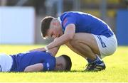 1 June 2024; Luke Fortune of Cavan checks on injured teammate Cian Reilly after a collision during the GAA Football All-Ireland Senior Championship Round 2 match between Cavan and Dublin at Kingspan Breffni in Cavan. Photo by Ramsey Cardy/Sportsfile