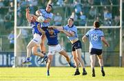 1 June 2024; James Smith and Padraig Faulkner of Cavan in action against Theo Clancy and Peadar Ó Cofaigh Byrne of Dublin during the GAA Football All-Ireland Senior Championship Round 2 match between Cavan and Dublin at Kingspan Breffni in Cavan. Photo by Ramsey Cardy/Sportsfile