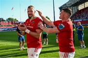 1 June 2024; Munster players RG Snyman, left, and Jack O’Donoghue after their side's victory in the United Rugby Championship match between Munster and Ulster at Thomond Park in Limerick. Photo by Seb Daly/Sportsfile