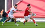 1 June 2024; Joey Carbery of Munster in action against Rob Herring of Ulster during the United Rugby Championship match between Munster and Ulster at Thomond Park in Limerick. Photo by Seb Daly/Sportsfile