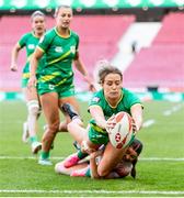 2 June 2024; Stacey Flood of Ireland scores a try during the HSBC Women's SVNS 2024 Grand Finals play-off match between Ireland and Great Britain at Civitas Metropolitano Stadium in Madrid, Spain. Photo by Juan Gasparini/Sportsfile