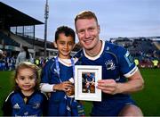 31 May 2024; Ciarán Frawley of Leinster is presented with a picture by Makaea Ngatai, son of Charlie Ngatai, after the United Rugby Championship match between Leinster and Connacht at the RDS Arena in Dublin. Photo by Harry Murphy/Sportsfile