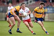 2 June 2024; Darragh Canavan of Tyrone in action against Manus Doherty of Clare during the GAA Football All-Ireland Senior Championship Round 2 match between Tyrone and Clare at O'Neill's Healy Park in Omagh, Tyrone.