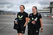 2 June 2024; Republic of Ireland's Kyra Carusa, left, and Erin McLaughlin at Dublin Airport ahead of the team's departure for their 2025 UEFA Women's European Championship Qualifier match against Sweden in Stockholm. Photo by Stephen McCarthy/Sportsfile
