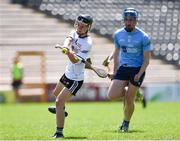 2 June 2024; Jack Mannix of East Cork scores a point despite the attention of Conal Murphy of Dublin during the Electric Ireland Corn John Scott Celtic Challenge final match between East Cork and Dublin at UPMC Nowlan Park in Kilkenny. Photo by Tom Beary/Sportsfile