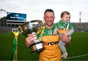 2 June 2024; Danny Cullen of Donegal with his eight month old son Danny after the Nickey Rackard Cup final match between Donegal and Mayo at Croke Park in Dublin. Photo by Ray McManus/Sportsfile