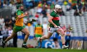 2 June 2024; Sean Regan of Mayo races clear of Oisin Grant of Donegal during the Nickey Rackard Cup final match between Donegal and Mayo at Croke Park in Dublin. Photo by Ray McManus/Sportsfile