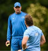 4 June 2024; Senior coach Jacques Nienaber, left, and Caelan Doris during Leinster Rugby squad training at UCD in Dublin. Photo by Ramsey Cardy/Sportsfile