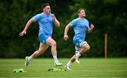 4 June 2024; Dan Sheehan, left, and Scott Penny during Leinster Rugby squad training at UCD in Dublin. Photo by Ramsey Cardy/Sportsfile